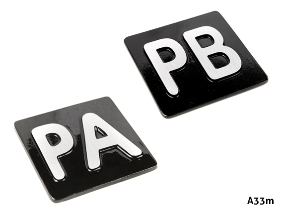 PLACAS DE ALUMINIO EN SOBRERELIEVE AUTOADHESIVAS PARA SEÑALIZACIÓN