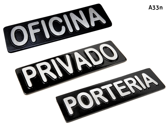 PLACAS DE ALUMINIO EN SOBRERELIEVE AUTOADHESIVAS PARA SEÑALIZACIÓN